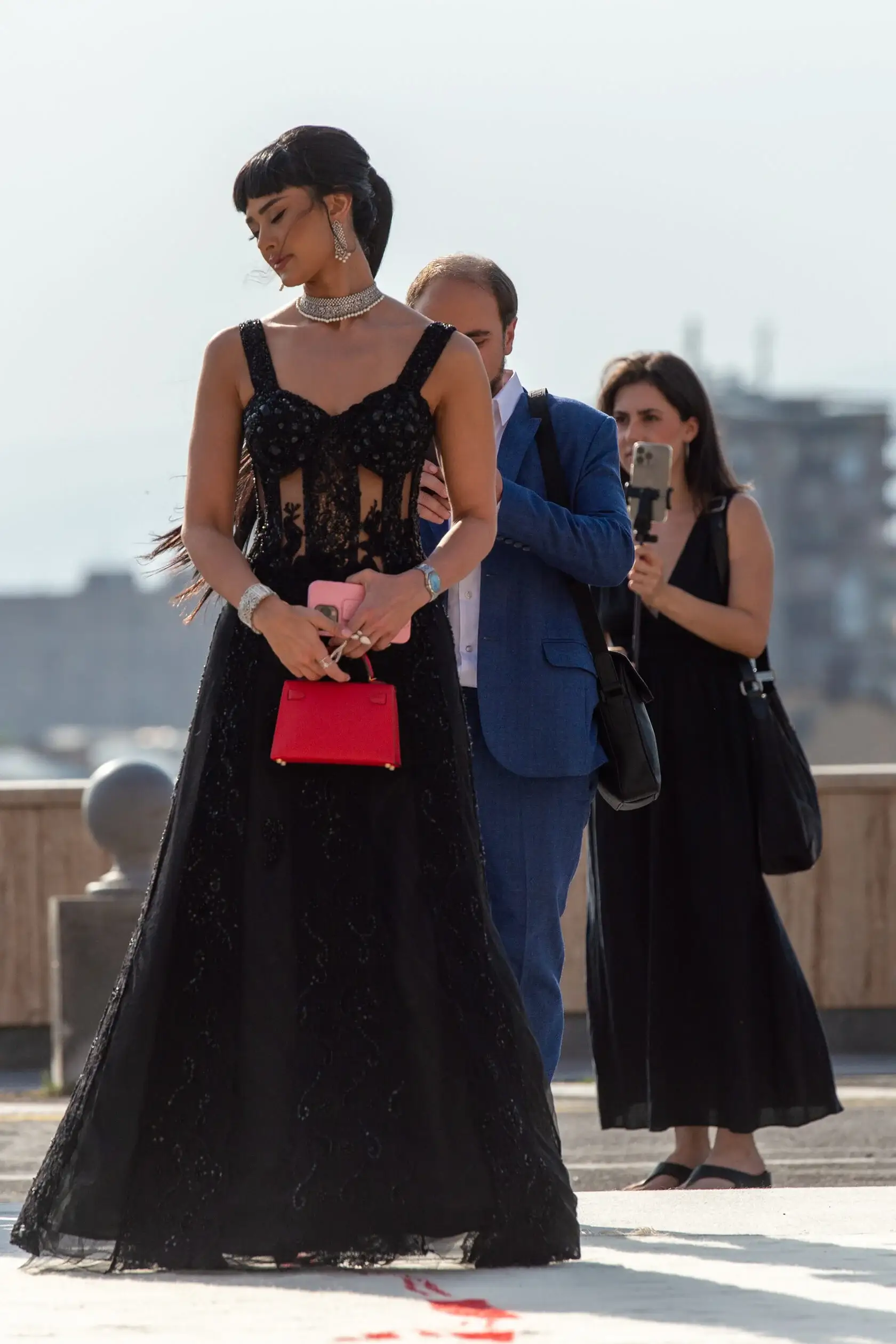women in golden apricot event