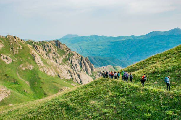 hiking to mountain in spring