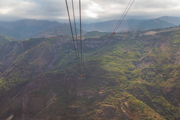 Beautiful view on the mountains of the South Caucasus. Cable car in the background. Wings of Tatev, Armenia.