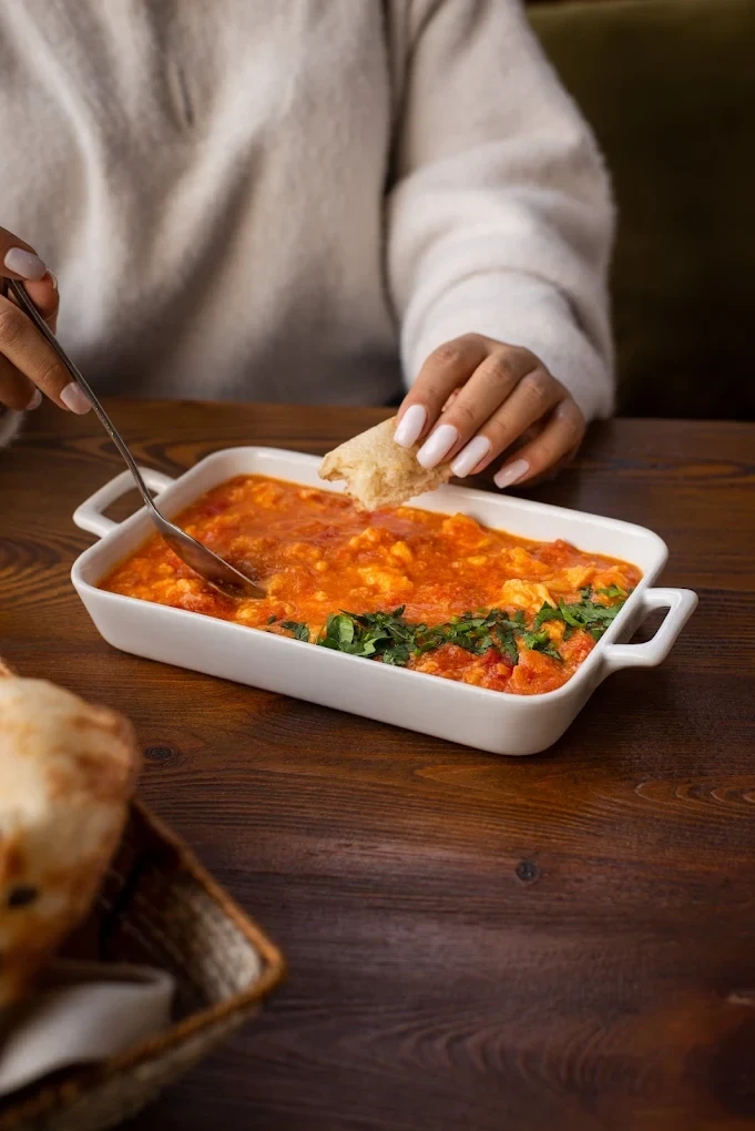 Friendly staff at Tsirani serving Arab guests with care