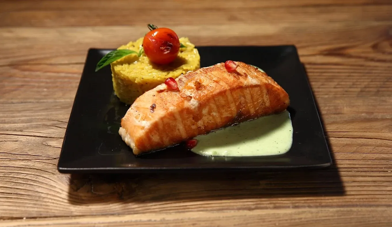 Stylish dining area at Tapastan welcoming Arab visitors