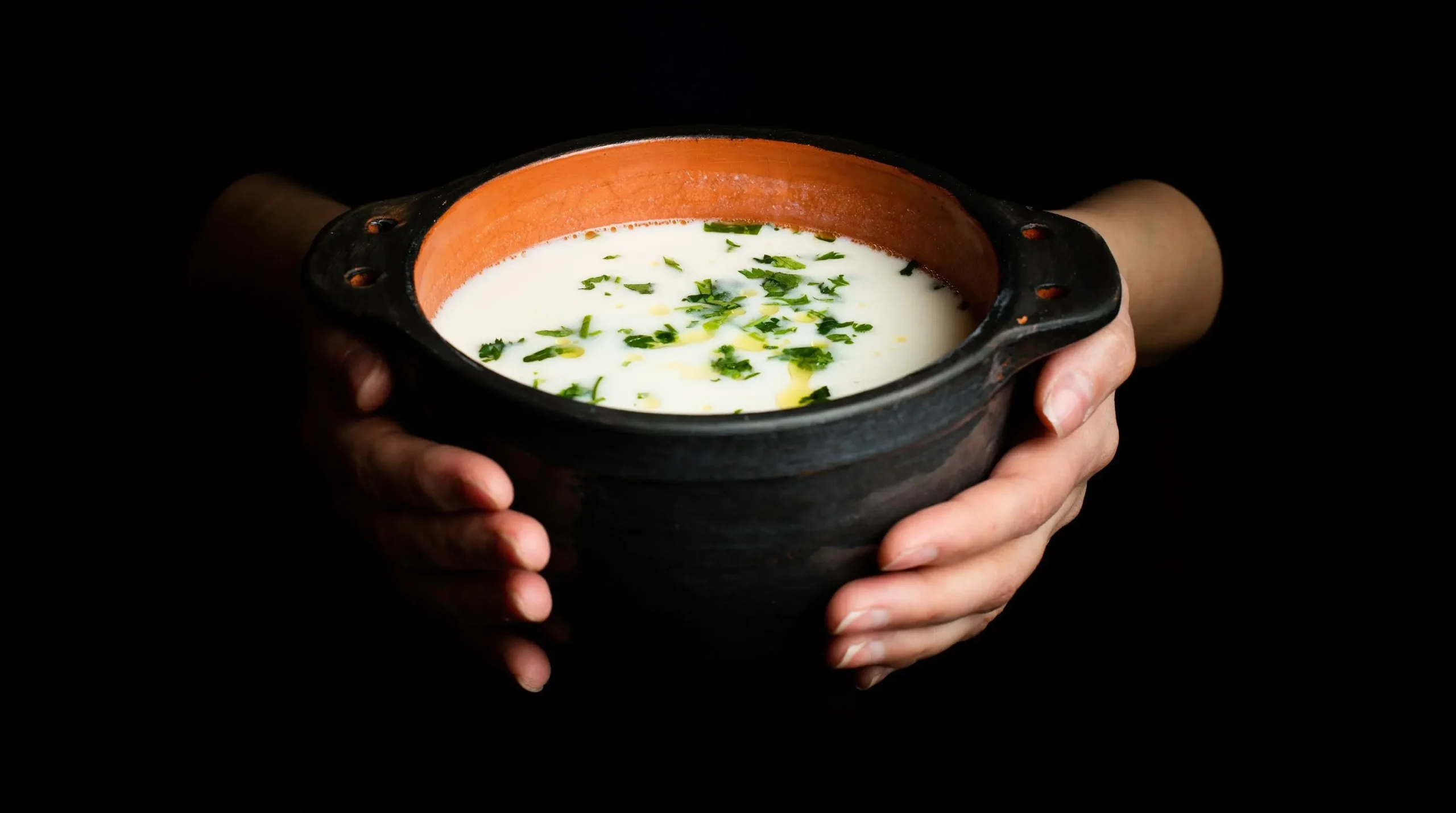 "Arab tourists enjoying authentic tavern atmosphere at welcoming Tavern Yerevan"