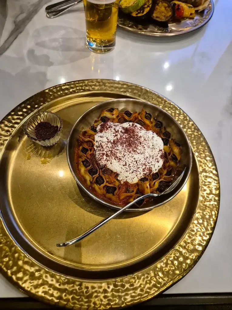 Attentive staff at Mayrig catering Arab guests