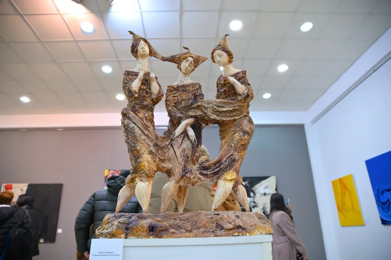 A collection of sculptures and decorative arts on display in the main hall.